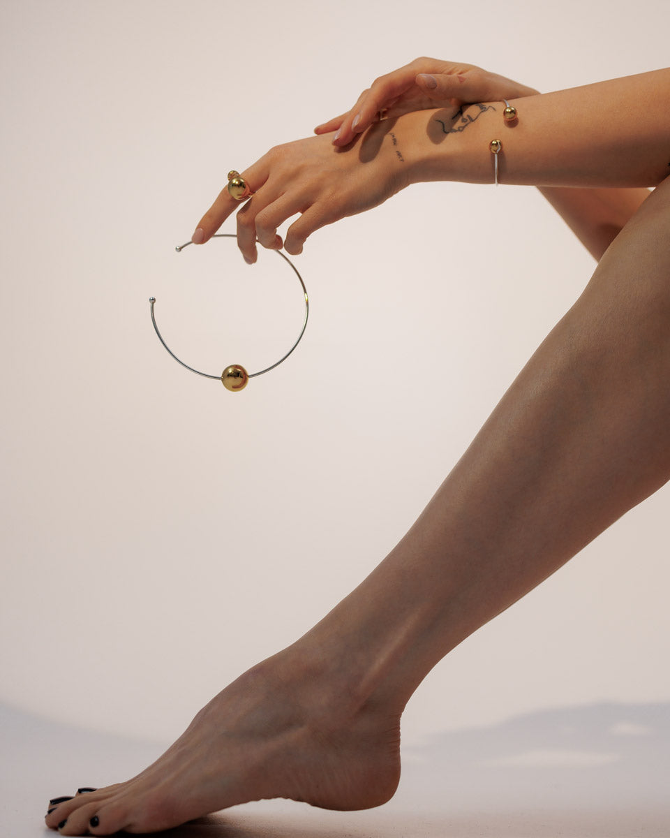 Твердий чокер з позолотою Куля