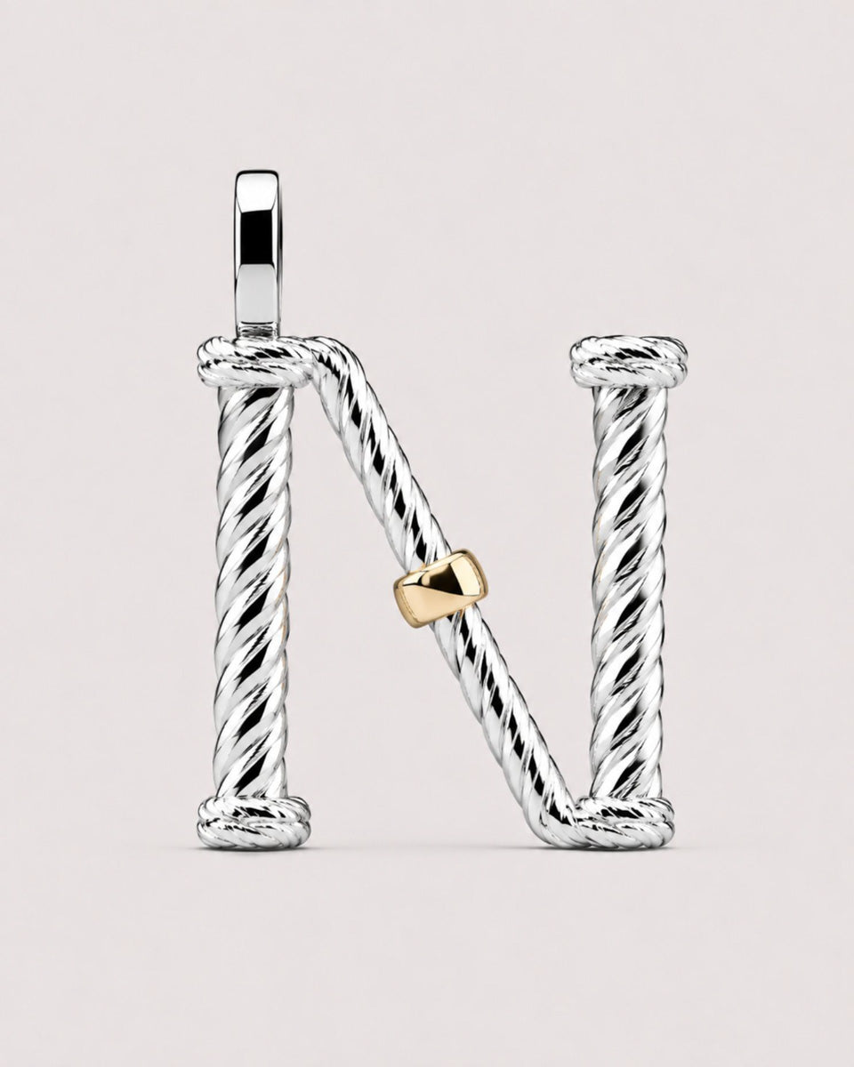 Срібна літера "N"