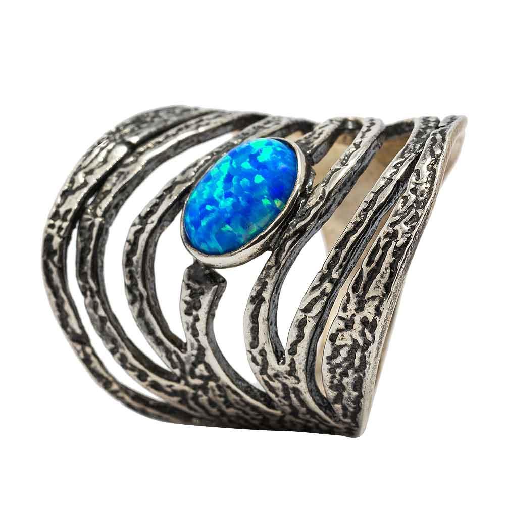 Широка срібна каблучка з блакитним опалом, Массивное серебряное кольцо волнообразное с овальным опалом в центре